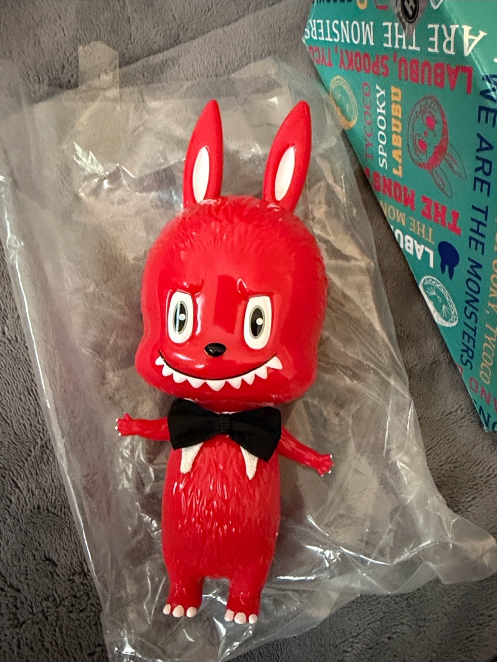 Labubu Well series Red 200% with black bow tie. How2works.